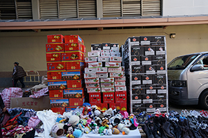 Stacks of cardboard boxes containing fruit on Ki Lung Street, Sham Shui Po, 8 February 2016