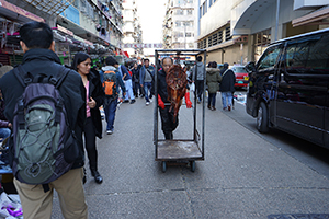 Roast meat being transported on Ki Lung Street, Sham Shui Po, 8 February 2016