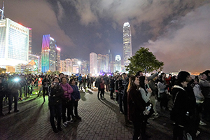 Crowds viewing Lunar New Year celebration fireworks, Central harbourfront, 9 February 2016