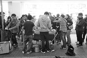 Hawkers selling street food at night, Mongkok, 9 February 2016