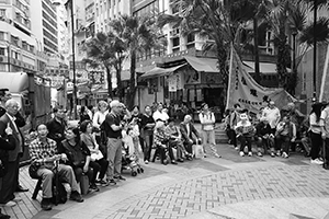 Crowds gathering for a Lion dance for the Lunar New Year, Bonham Strand, Sheung Wan, 13 February 2016