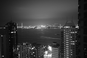 Victoria Harbour and Stonecutters Island at night, viewed from Sheung Wan, 15 February 2016