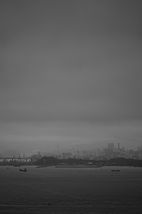 Stonecutters Island and Victoria Harbour on a cloudy day, viewed from Sheung Wan, 24 March 2016
