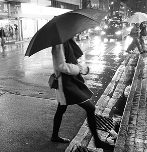 Street scene on a rainy night, Des Voeux Road Central, Sheung Wan, 21 March 2016