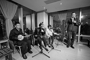 Music performance after an exhibition opening, Central, 21 March 2016