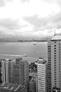 Victoria Harbour and Stonecutters Island, viewed from an apartment in Sheung Wan, 24 March 2016