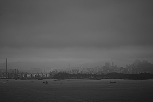 Victoria Harbour and Stonecutters Island on a cloudy day, viewed from Sheung Wan, 24 March 2016