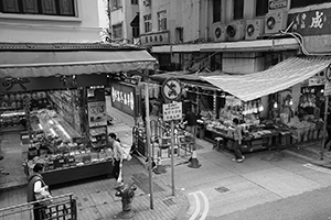 Street scene at the junction of Des Voeux Road West and Mui Fong Street, Sai Ying Pun, 1 April 2016