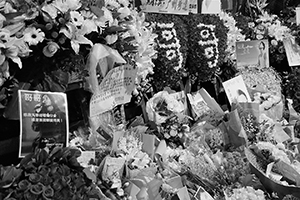 Memorials placed outside the Mandarin Oriental Hotel, Central, in remembrance of actor and singer Leslie Cheung, on the anniversary of his suicide, 1 April 2016