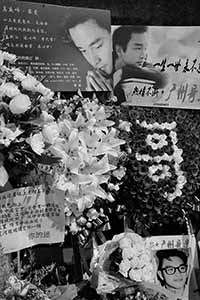 Memorials placed outside the Mandarin Oriental Hotel, Central, in remembrance of actor and singer Leslie Cheung, on the anniversary of his suicide, 1 April 2016