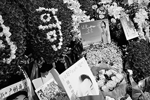 Memorials placed outside the Mandarin Oriental Hotel, Central, in remembrance of actor and singer Leslie Cheung, on the anniversary of his suicide, 1 April 2016