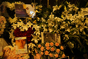 Memorials placed outside the Mandarin Oriental Hotel, Central, in remembrance of actor and singer Leslie Cheung, on the anniversary of his suicide, 1 April 2016