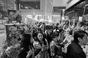 Memorials placed outside the Mandarin Oriental Hotel, Central, in remembrance of actor and singer Leslie Cheung, on the anniversary of his suicide, 1 April 2016
