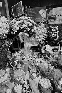 Memorials placed outside the Mandarin Oriental Hotel, Central, in remembrance of actor and singer Leslie Cheung, on the anniversary of his suicide, 1 April 2016
