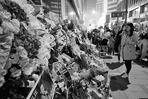 Memorials placed outside the Mandarin Oriental Hotel, Central, in remembrance of actor and singer Leslie Cheung, on the anniversary of his suicide, 1 April 2016