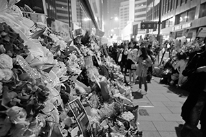 Memorials placed outside the Mandarin Oriental Hotel, Central, in remembrance of actor and singer Leslie Cheung, on the anniversary of his suicide, 1 April 2016