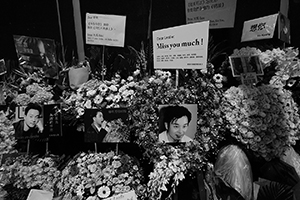 Memorials placed outside the Mandarin Oriental Hotel, Central, in remembrance of actor and singer Leslie Cheung, on the anniversary of his suicide, 1 April 2016