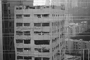 Reflection of buildings in a building, North Point, 2 April 2016