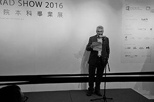 John Aiken giving a speech at the opening of a graduation show at the Academy of Visual Arts, Baptist University, Kwun Tong Road, Ngau Tau Kok, 27 May 2016