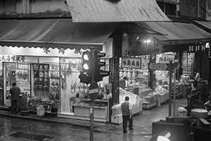 Shops on Des Voeux Road West at the junction with Sutherland Street, 12 June 2016