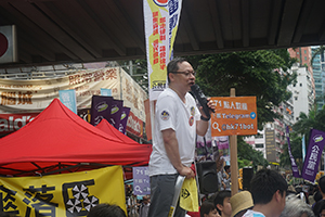Democracy activist Benny Tai Yiu-ting addressing demonstrators at the annual protest march, Hennessy Road, Wanchai, 1 July 2016
