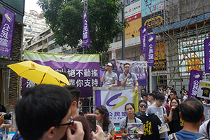 Members of the Civic Party addressing demonstrators at the annual protest march, Hennessy Road, Causeway Bay, 1 July 2016