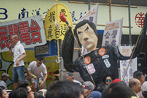 Citizens' Radio and a figure of Leung Chun-ying at the annual protest march, Hennessy Road, Causeway Bay, 1 July 2016