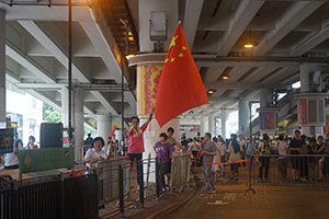 Counter-protesters with a PRC flag at the annual protest march, Canal Road East, Causeway Bay, 1 July 2016