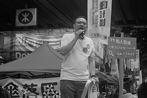 Democracy activist Benny Tai Yiu-ting addressing demonstrators at the annual protest march, Hennessy Road, Wanchai, 1 July 2016