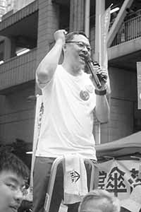 Democracy activist Benny Tai Yiu-ting addressing demonstrators at the annual protest march, Hennessy Road, Wanchai, 1 July 2016