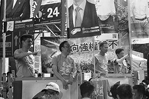 Members of the Civic Party addressing demonstrators at the annual protest march, Hennessy Road, Wanchai, 1 July 2016