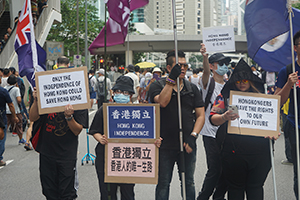 Demonstrators calling for Hong Kong independence at the annual protest march, Hennessy Road, Wanchai, 1 July 2016