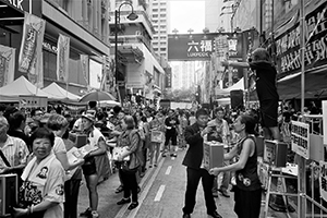 Leung Kwok-hung and other participants at the annual protest march, Causeway Bay, 1 July 2016