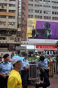Police at the annual protest march, Yee Wo Street, Causeway Bay, 1 July 2016