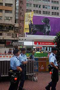 Police at the annual protest march, Yee Wo Street, Causeway Bay, 1 July 2016