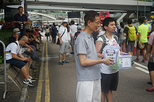 Civil Human Rights Front accepting donations at the annual protest march, Wanchai, 1 July 2016