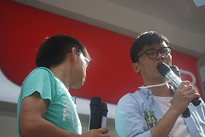 Members of political party Demosisto addressing demonstrators at the annual protest march, Yee Wo Street, Causeway Bay, 1 July 2016