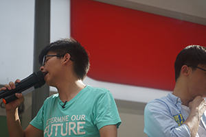 Joshua Wong addressing demonstrators at the annual protest march, Yee Wo Street, Causeway Bay, 1 July 2016