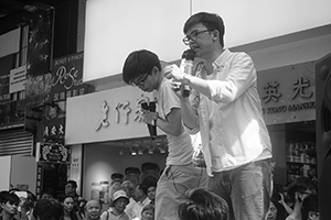 Members of political party Demosisto addressing demonstrators at the annual protest march, Yee Wo Street, Causeway Bay, 1 July 2016