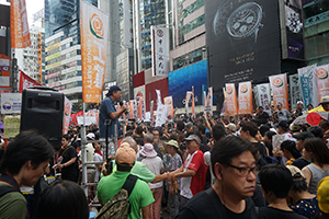 Lee Cheuk-yan of the Labour Party addressing demonstrators at the annual protest march, Hennessy Road, Causeway Bay, 1 July 2016