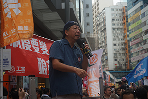 Lee Cheuk-yan of the Labour Party addressing demonstrators at the annual protest march, Hennessy Road, Causeway Bay, 1 July 2016