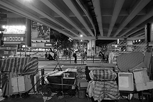 Packed-away stalls and equipment for 'villain-hitting', underneath the Canal Road Flyover, 21 August 2016