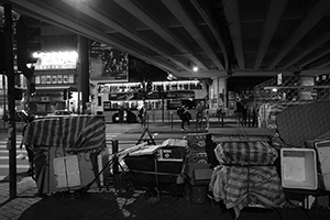 Packed-away stalls and equipment for 'villain-hitting', underneath the Canal Road Flyover, 21 August 2016
