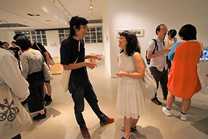 Artist South Ho and curator Tina Pang, at the opening of Wong Wai Yin's exhibition, Spring Workshop, Wong Chuk Hang, 20 August 2016