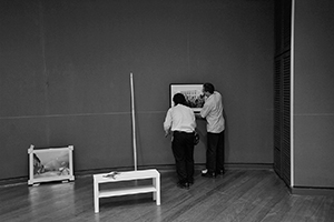Hanging David Clarke's photographs for the exhibition 'Interruptions', University Museum and Art Gallery, HKU, 12 September 2016