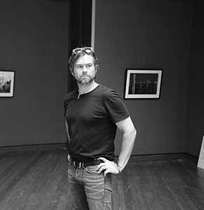 Curator Christopher Mattison, preparing for the opening of the exhibition 'Interruptions', University Museum and Art Gallery, HKU, 12 September 2016
