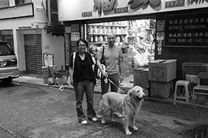 Sara Wong and Warren Leung with their dog,  New Street, Sheung Wan, 12 October 2016