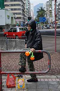 Street Sleeper with balloons, Kowloon, 28 January 2017