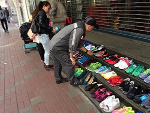 Shop occupying the entrance of a closed bank, Des Voeux Road Central, Sheung Wan, 22 January 2017