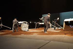 Workers preparing the stage in the Cultural Centre Grand Theatre for a performance by Tanztheater Wuppertal Pina Bausch of Rite of Spring, 8 March 2017